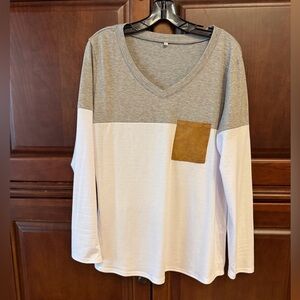 NWOT along sleeve white/grey t-shirt with faux suede pocket. Never worn.